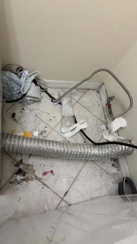 Cleaning under the washer before cleaning