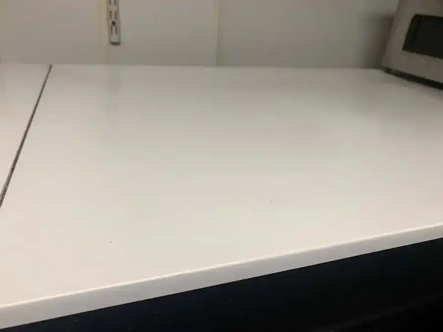 Inside a kitchen cabinet after Raisa’s detailed cleaning
