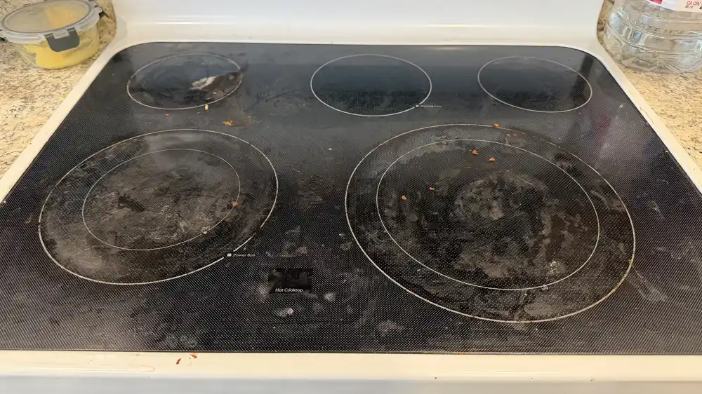 Glass stovetop cleaning before cleaning
